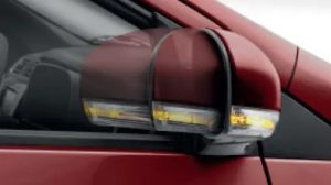 Retractable side mirrors with turn signals